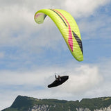 ZOOM X2C LT lightweight in Lime colour EN-C 2-liner paraglider flying against blue sky
